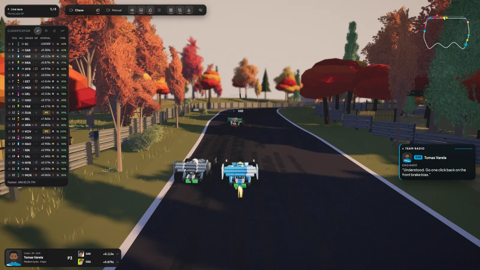 Chase camera view of two cars running side by side down a straight in Little Engines